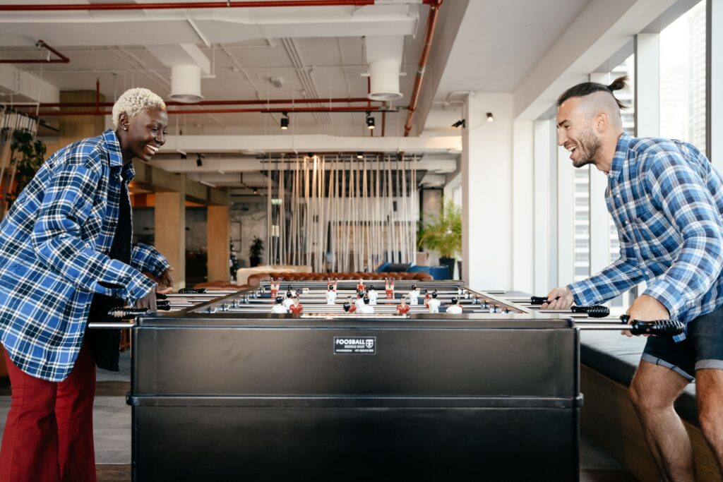 Professionals enjoying breakout spaces in a modern coworking environment