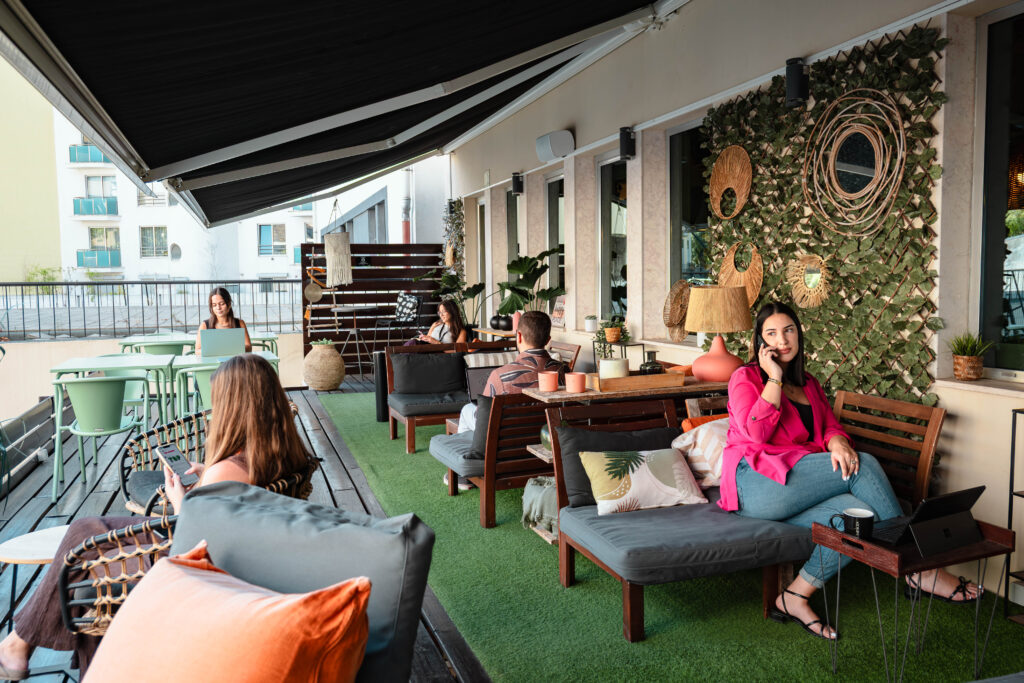The outdoor terrace at Avila Spaces Avenida da República provides an alternative setting for informal working and conversation.